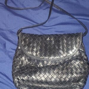 Black Crossbody Bag with Woven Design and Flap Closure